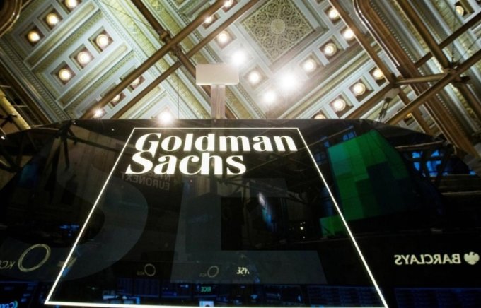 A Goldman Sachs sign is seen above the floor of the New York Stock Exchange shortly after the opening bell in the Manhattan borough of New York January 24, 2014. REUTERS/Lucas Jackson